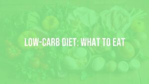 A colorful assortment of low-carb foods including fresh vegetables, lean meats, eggs, and healthy fats, arranged neatly on a wooden table, bright and appetizing, realistic.